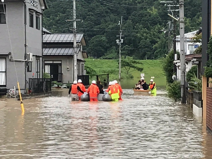 写真：平成30年7月豪雨時の住民運搬支援